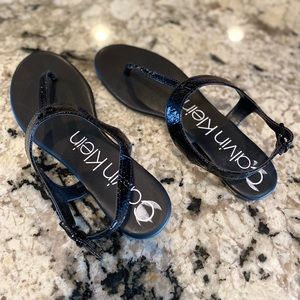 Brand new, never worn Calvin Klein sandals, size 9.